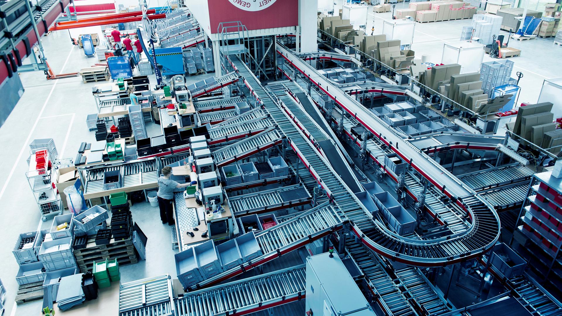 Order picking in the mini-load storage at the viastore distribution centre at Gemü, Manufacturing Industry