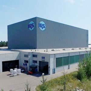 Frontal view of Rettenmaier's logistics center, viastore high-bay warehouse in the center