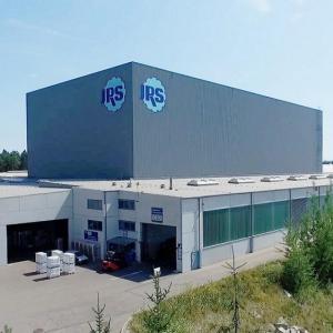 Frontal view of Rettenmaier's logistics center, viastore high-bay warehouse in the center